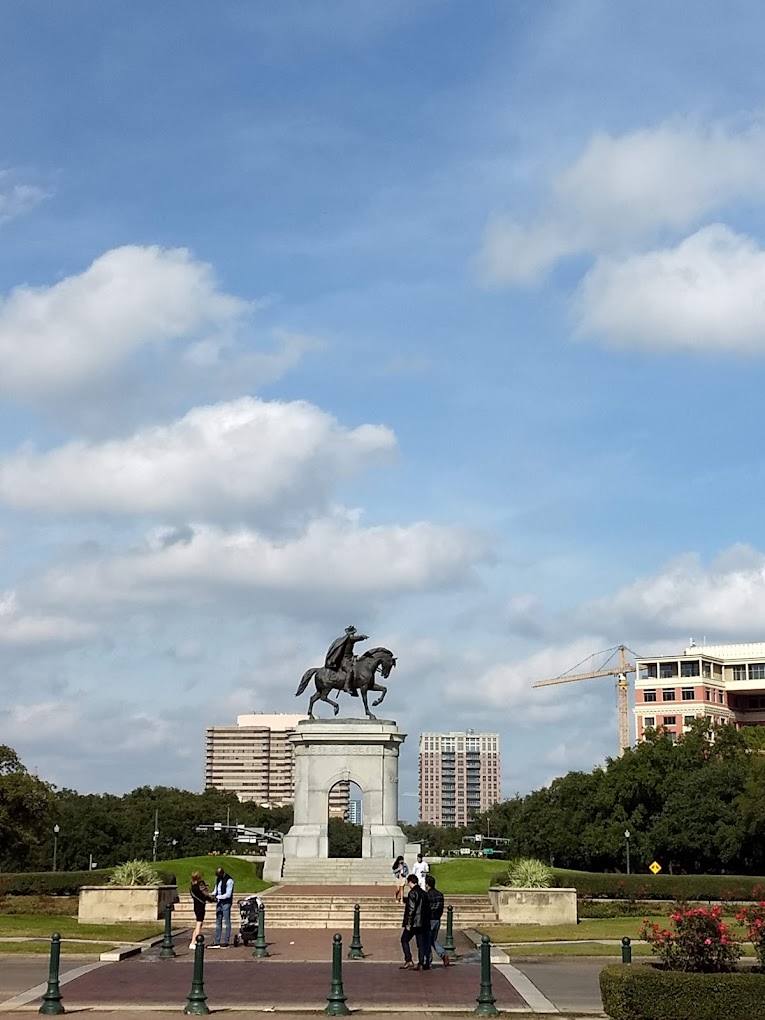 Sam Houston equestrian monument at the entrance to Hermann Park under a wide Texas sky